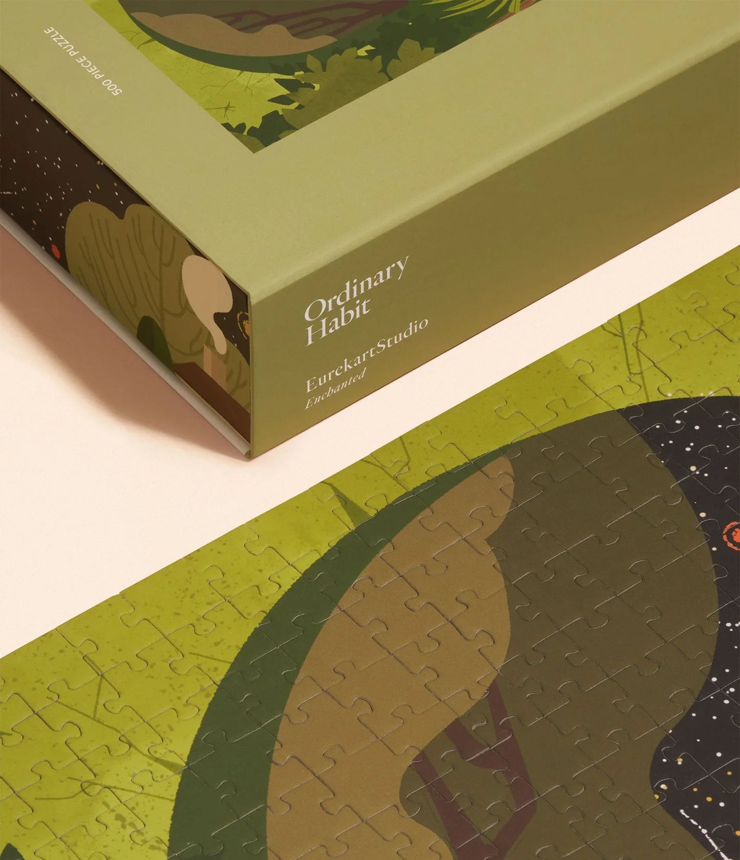 Corner of the box of a 500 piece puzzle by Ordinary Habits representing a mindful activity and daily ritual.