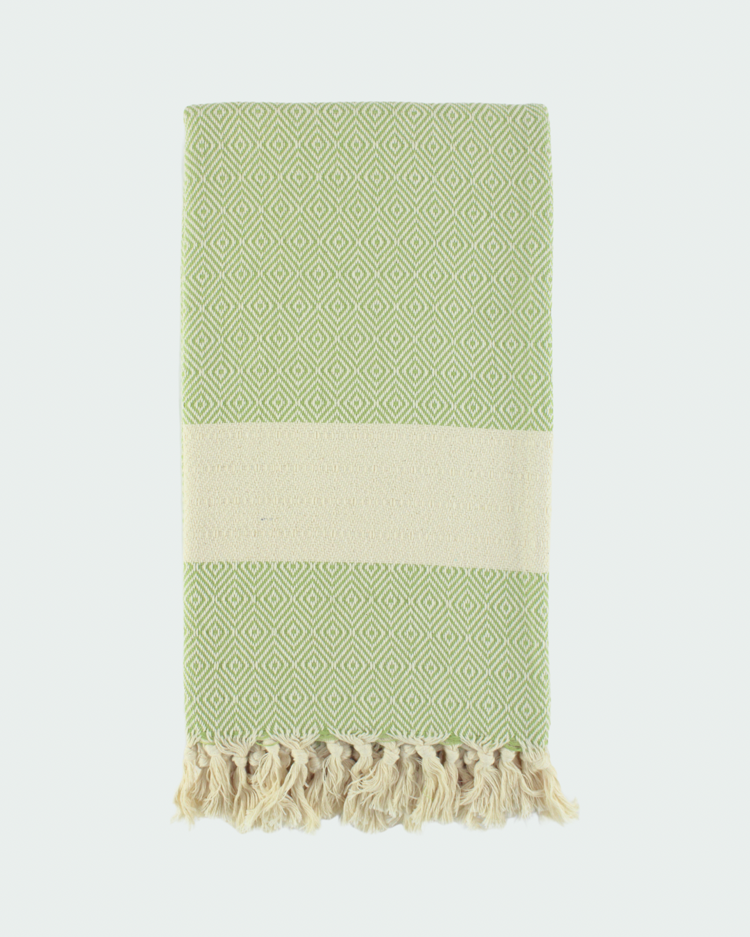 Turkish cotton peshtemal, thin beach towels in diamond design, in white and light pistachio green color.