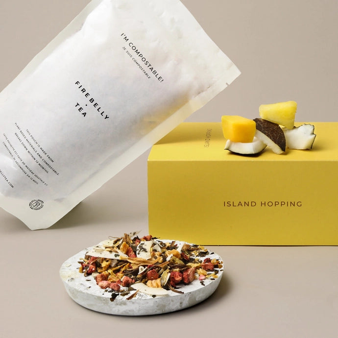 A bag of organic loose herbal tea leaf made with coconut and mango.