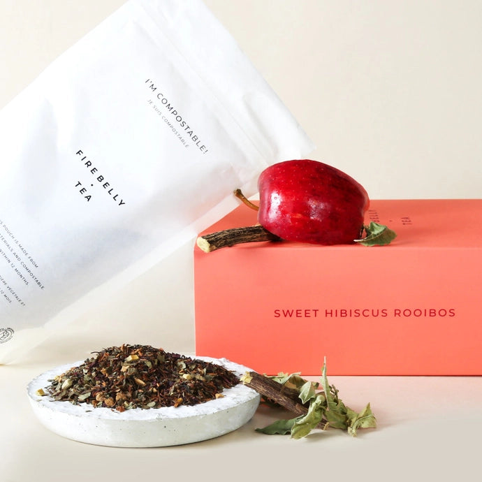 A bag of organic loose herbal tea leaf made with hibiscus and apple and rooibos.
