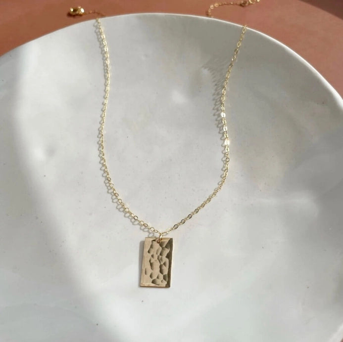 14k gold filled charm necklace in yellow gold, by Token Jewelry.