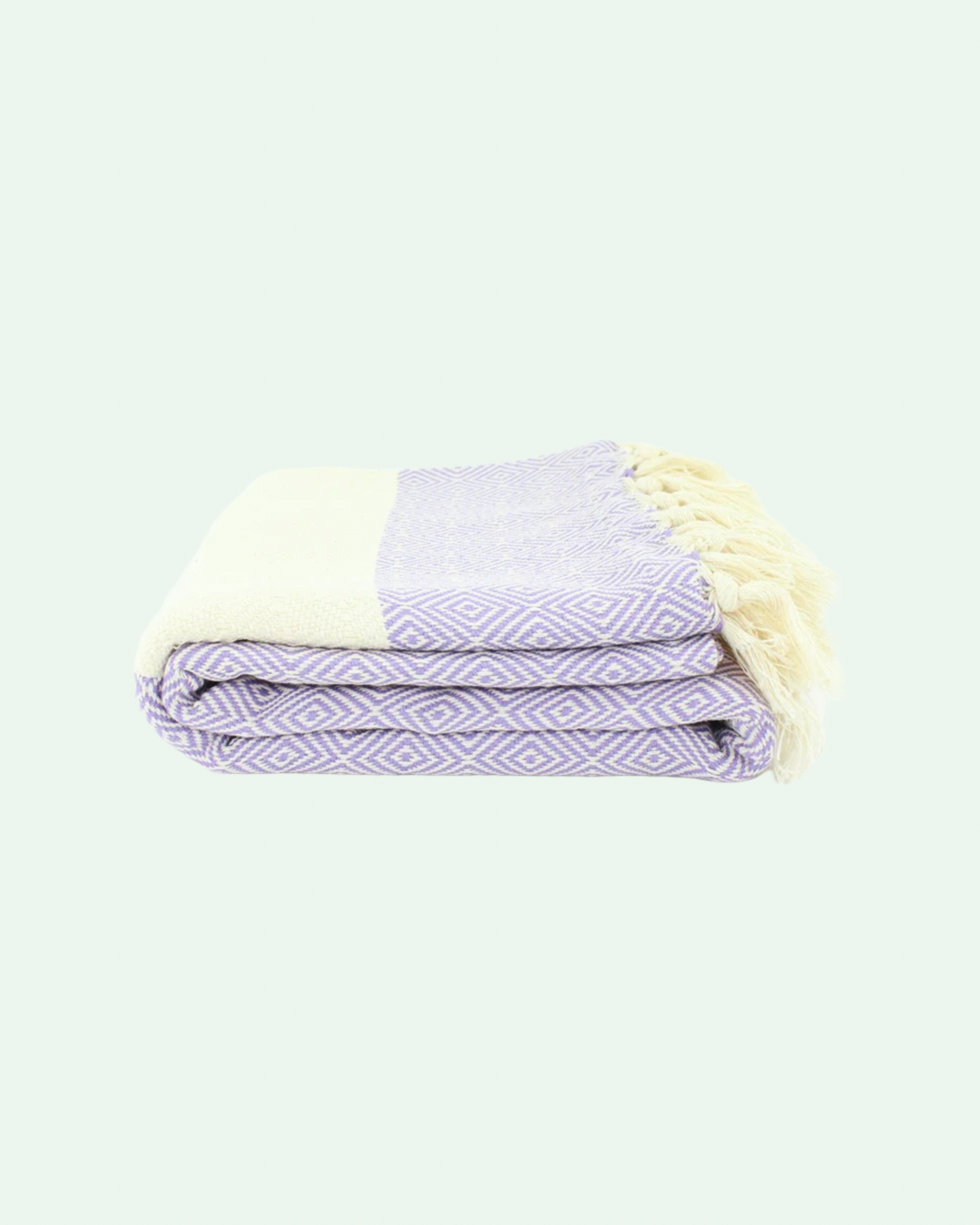 Turkish cotton peshtemal, thin beach towels in diamond design, in white and lilac color.
