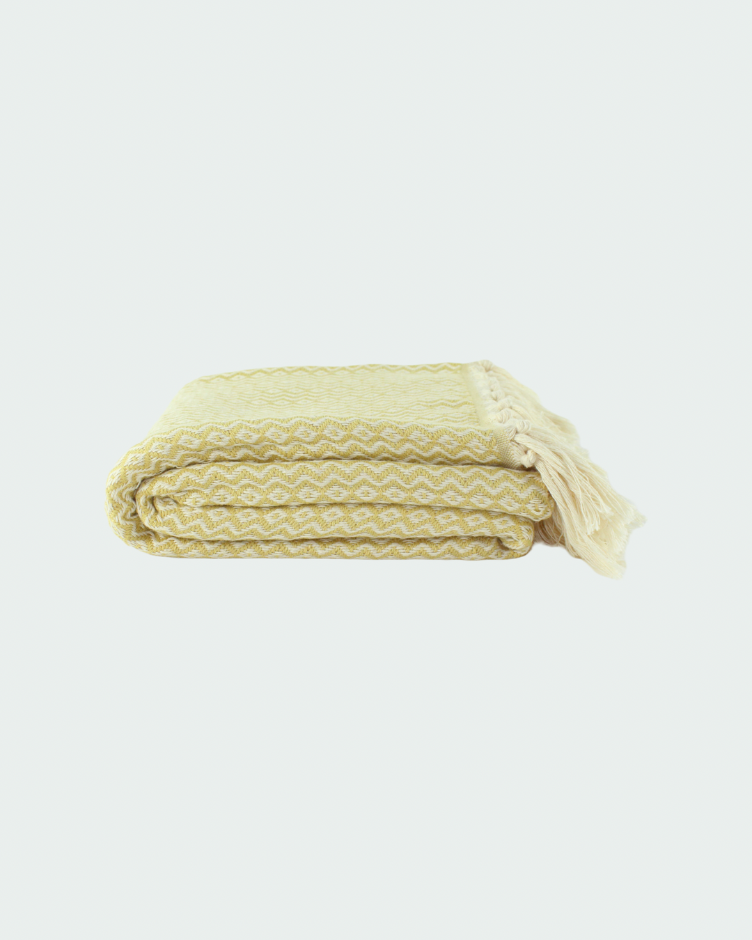 Turkish cotton peshtemal, thin beach towels in diamond design, in white and light yellow color.