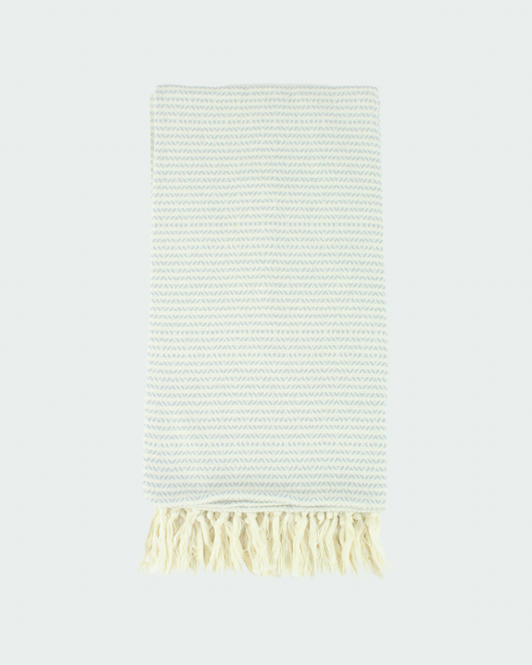 Turkish cotton peshtemal, thin beach towels in diamond design, in white and light grey color.
