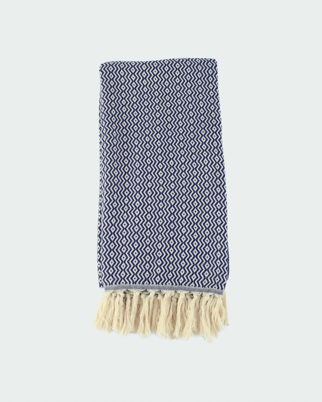Turkish cotton peshtemal, thin beach towels in diamond design, in white and navy blue color.